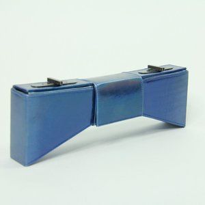 Metallic Blue Bow Clutch by Trang Phung